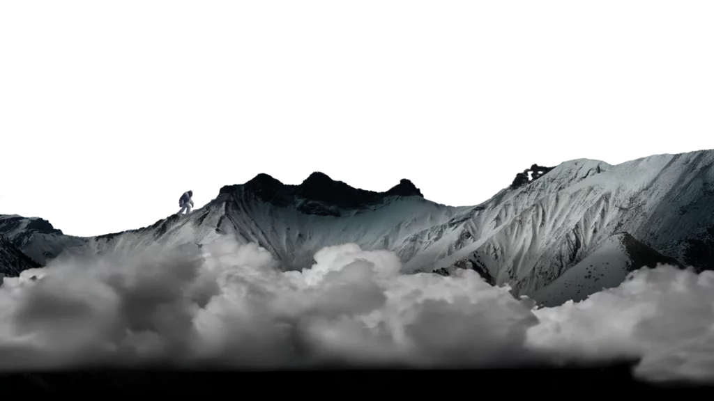 Persona escala por la cresta de una montaña rocosa y nevada